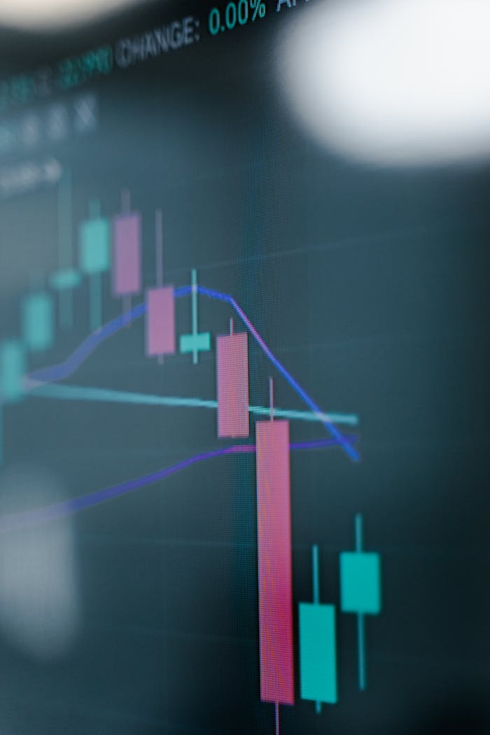 » pexels photo 7567223 1 Close-up of a digital stock market chart showcasing analytics on a screen.